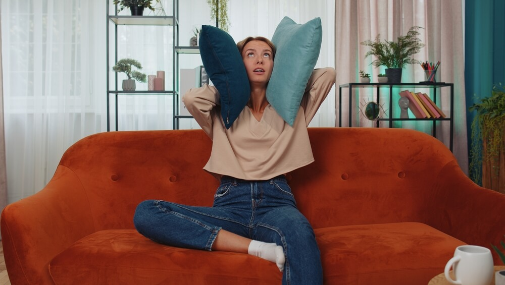 A woman struggling with noise complaints