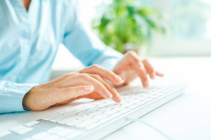 Person researching a vacation rental management company