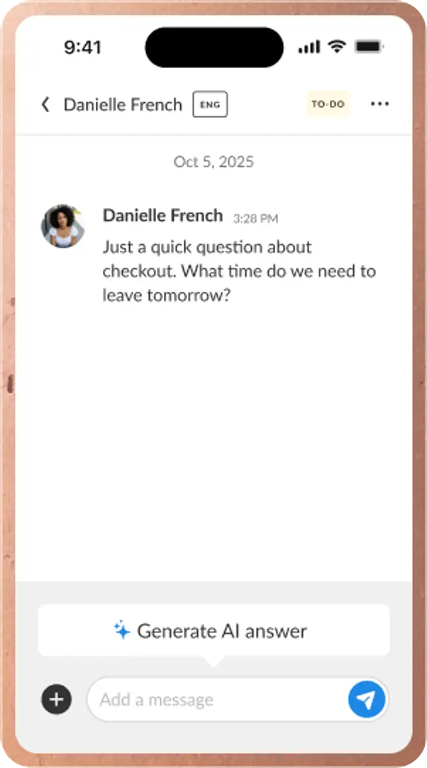 The iGMS inbox on a phone: a guest asks what time checkout is, and a suggested reply is ready to send.