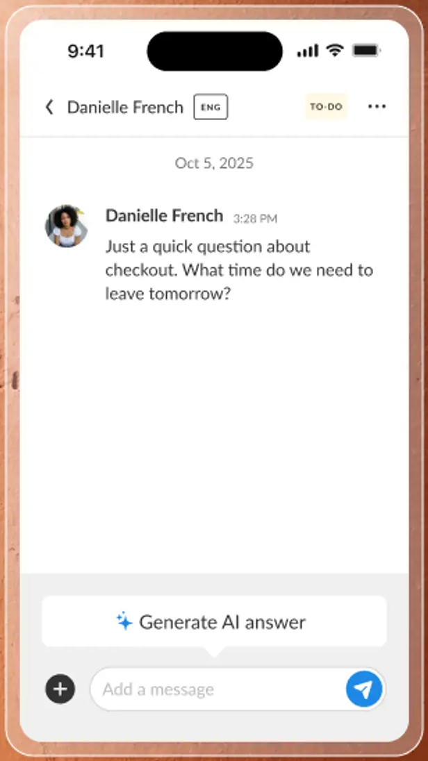 The iGMS inbox on a phone with a guest question and a drafted reply